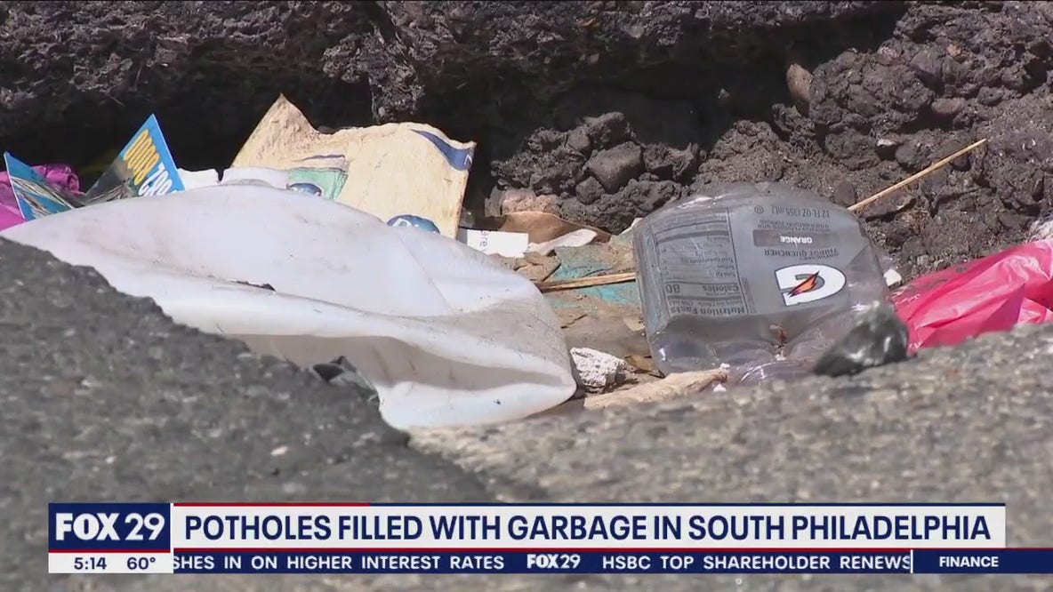 Trash-filled pothole in South Philadelphia creates danger for drivers, pedestrians